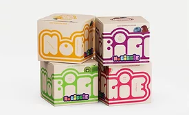 Stacked cartons of sparkling juice drink variety packs in multiple fruit flavors with colorful retail packaging.