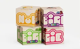 Stacked cartons of sparkling juice drink variety packs in multiple fruit flavors with colorful retail packaging.