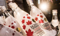 The design for Jackson Springs pure alkaline water features colorful red maple leafs on a distinctive label that creates a frosted look, which makes the 1-liter PET bottle looked chilled at all times - Beverage Industry