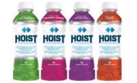Hoist bottles with shrink sleeves. - Beverage Industry