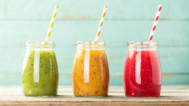 three fruit smoothies in a row