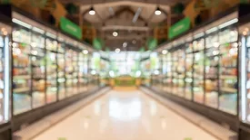 supermarket grocery store aisle and shelves blurred background