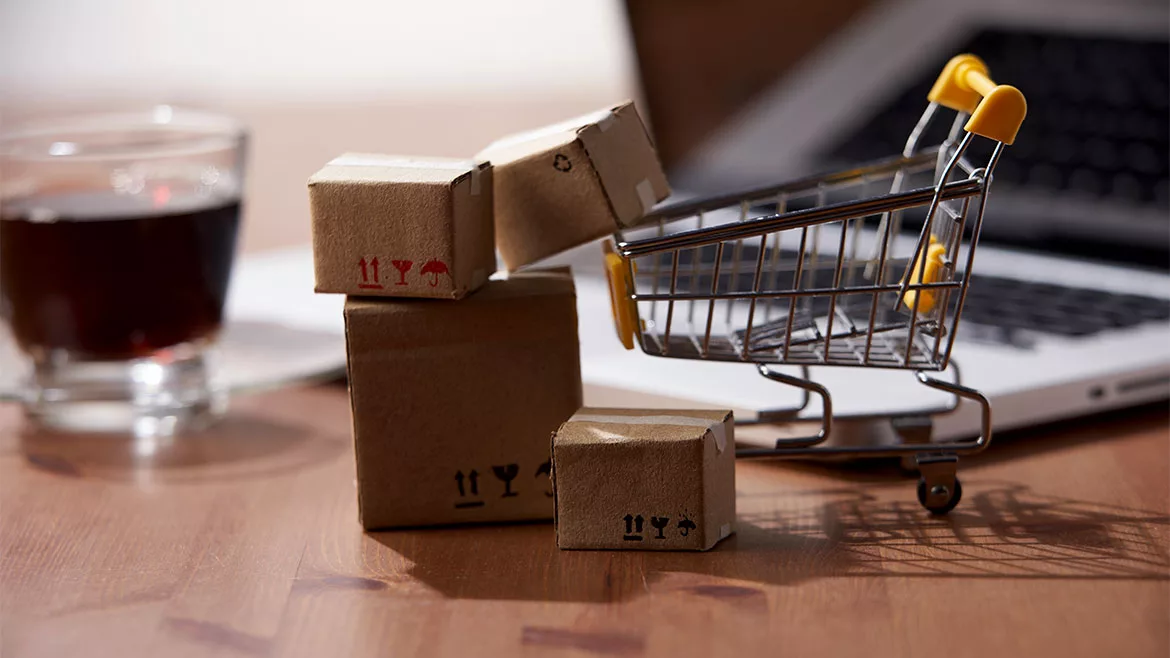 miniature shopping cart and boxes