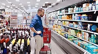 a man shopping at the grocery store a man shopping at the grocery store