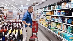 a man shopping at the grocery store