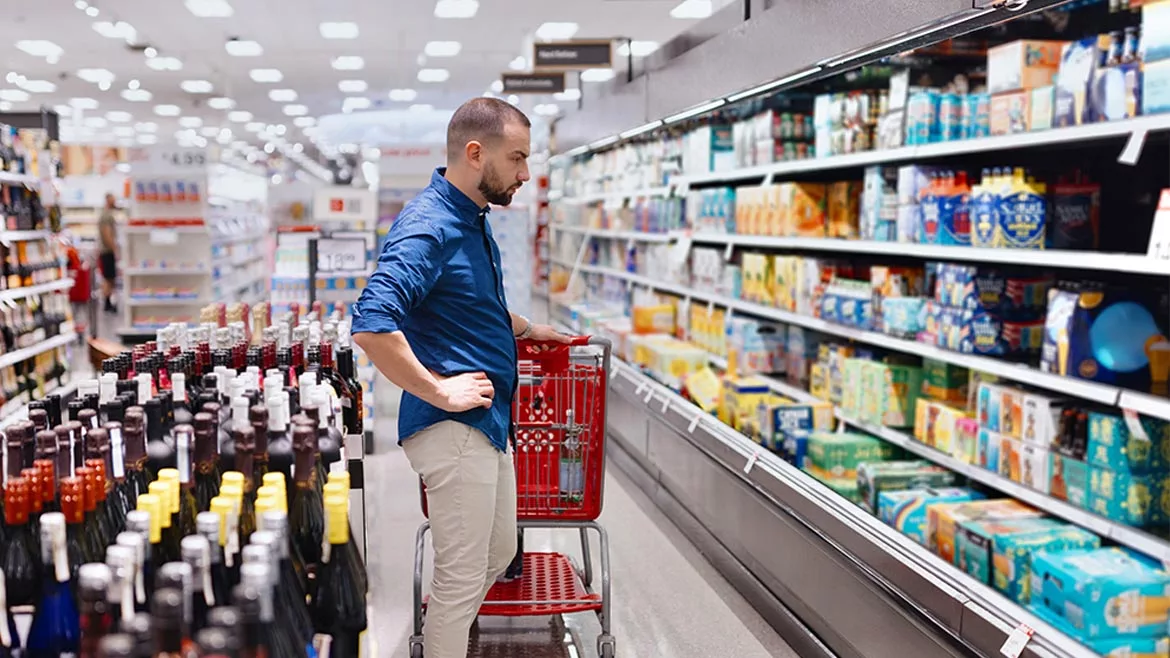 a man shopping at the grocery store