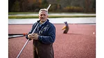 people in a cranberry bog during harvest