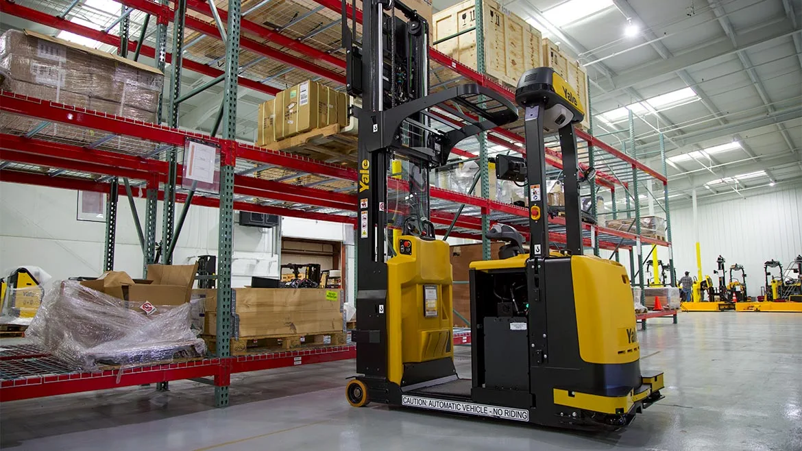 a yellow and black Yale automated lift truck / reach truck