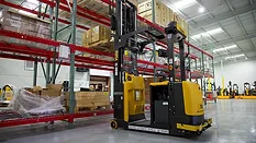 a yellow and black Yale automated lift truck / reach truck