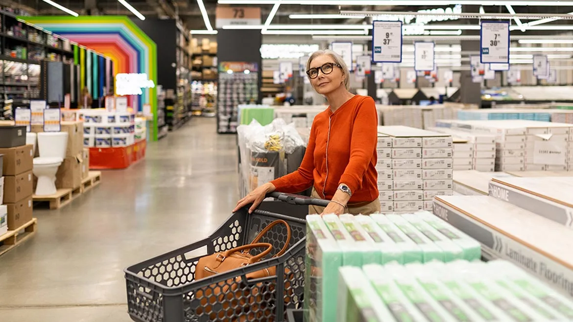a woman shopping for supplies in a home improvement store