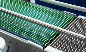  a specialized multidirectional conveyor system utilizing a modular roller-top belt