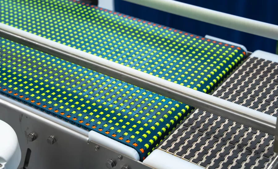 a specialized multidirectional conveyor system utilizing a modular roller-top belt
