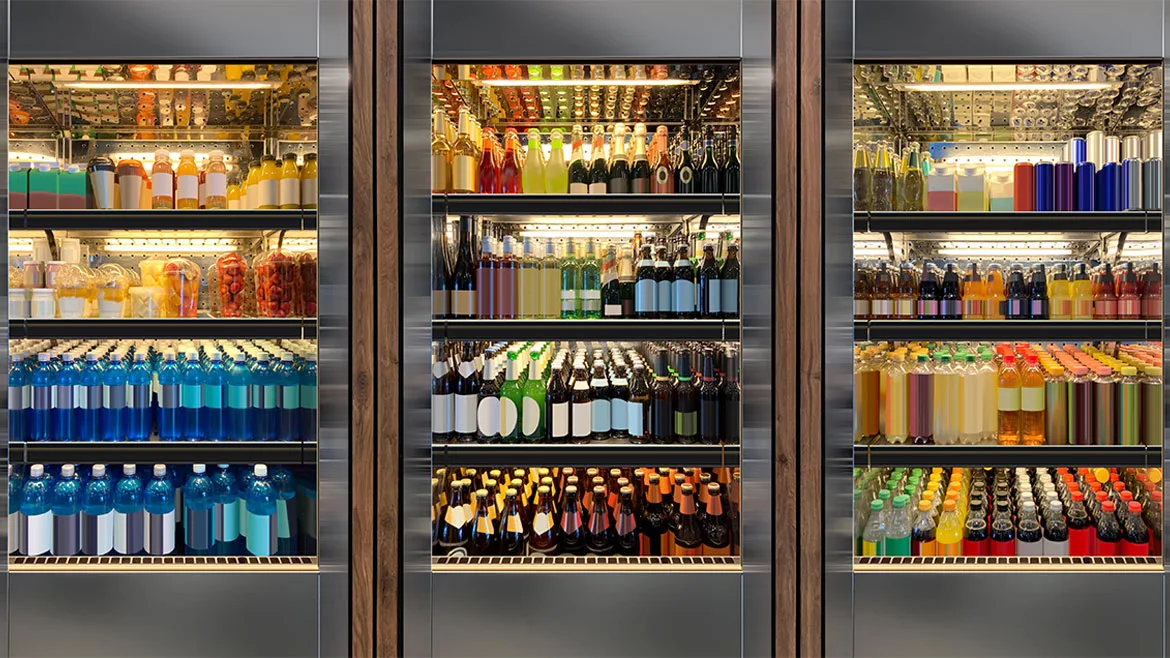 These commercial glass door refrigerators are stocked with a variety of beverages, including sodas and wines.