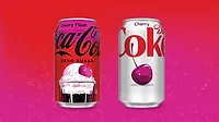 The image features Coca-Cola Zero Sugar Cherry Float and Diet Coke Cherry sodas. The image features Coca-Cola Zero Sugar Cherry Float and Diet Coke Cherry sodas.