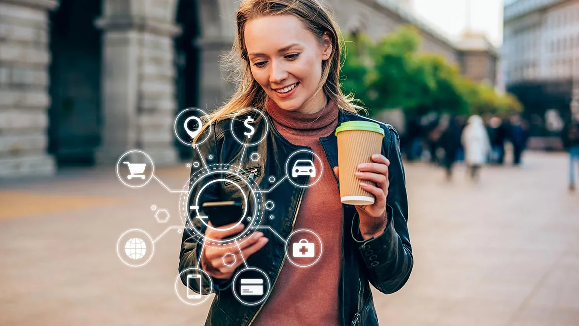 digital and mobile banking, showing a person using a smartphone surrounded by floating icons that represent online financial services