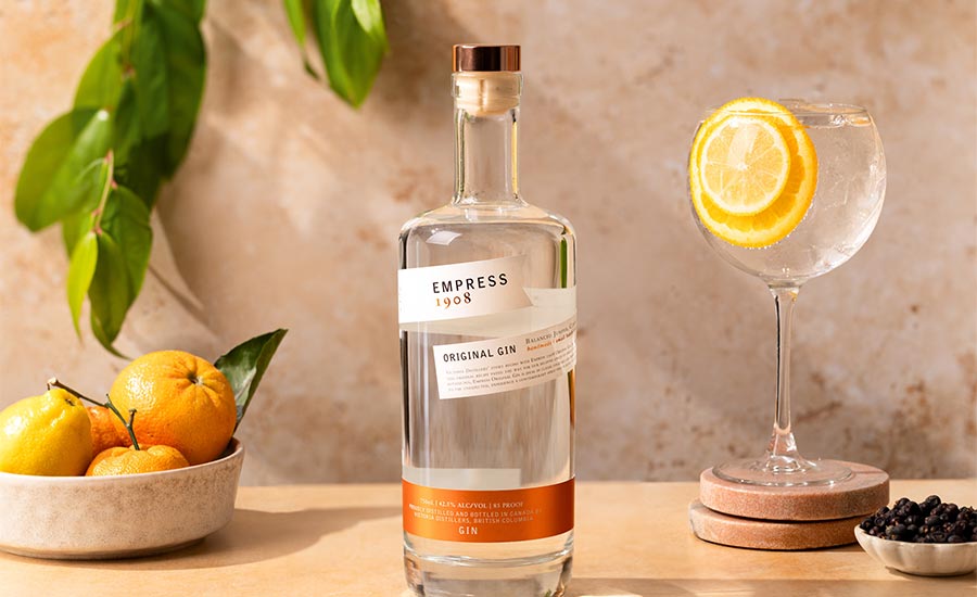 a bottle of Empress 1908 Original Gin, a crystal-clear, full-bodied contemporary gin crafted by Victoria Distillers