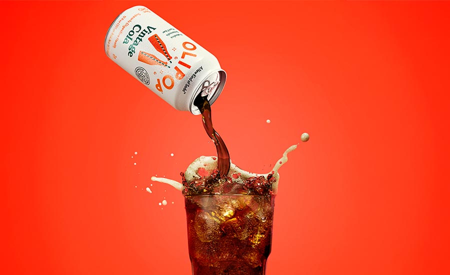 This is a can of Olipop Vintage Cola, a prebiotic soda designed to support digestive health