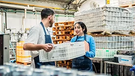 workers in a food and beverage manufacturing facility