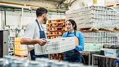 workers in a food and beverage manufacturing facility